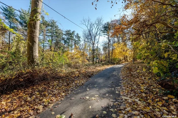 Build your dream home on secluded 2+ acre lot in Oyster Bay Cove. Part of the famed Sunken Orchard Estate.  Serene and quiet neighborhood. Close to all.