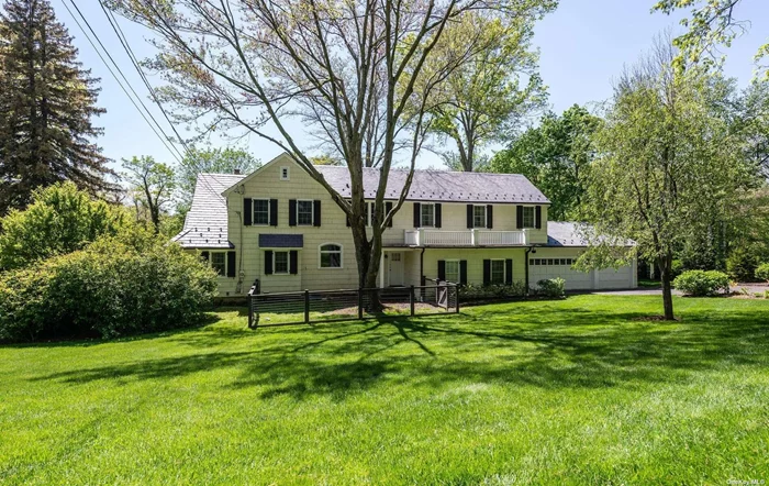 Built with character and charm this 11 room colonial with slate roof offers original architectural details combined with many modern amenities for comfortable living. On the first floor a 3-room suite with private entrance and full bath may serve as home office, guest suite or playroom (no CAC in this area). Situated on .92 acre the property features beautiful specimen plantings of trees, shrubs and perennials, flagstone patio and gunite salt water pool with brick surround.  This stunning property has been lovingly maintained inside and out.