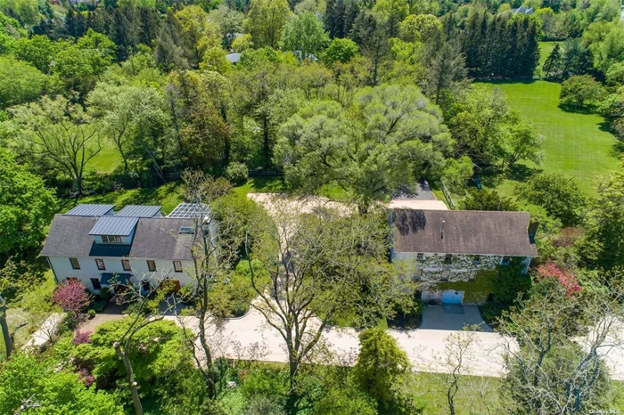 Opportunities abound at this one of a kind French Countryside gem. Upon entering the driveway, you will be transported to a rare residence offering two unique structures. Bring your horses, car collection or art studio because there is room for all. A former farm for storing dahlias, the main house was brought down to the studs and completely rebuilt 2011 featuring a dramatic design with Marvin French casement windows, custom flooring, new kitchen baths , plumbing, electric , Nuvo sound system, generator and more . There is a separate 4-story barn offering loft space for all your needs with outside access on two levels The property is a flat rolling 2 acre parcel with open lawn and beautiful gardens .CSH SD#2, Laurel Hollow village beach with dock, close to train and parkways . Pre approval required for appointment to be scheduled .