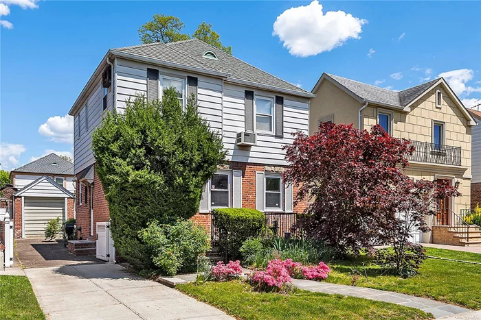 Charming and delightful single family home nested in one of the most beautiful tree-lined block in Fresh Meadows. This two-story residence with 3 bedrooms & 1.5 bathrooms features a private garage and driveway coupled with a perfectly landscaped front and backyard oasis. Enter into the spacious living room submerged by natural sunlight through the wall of windows highlighted by original window shutters and crown molding connecting to a family-sized dining room. The dining room seamlessly leads to an expansive family room/den overlooking the backyard optimal for entertaining purposes. The modernized eat-in chef&rsquo;s kitchen is outfitted with stainless steel appliances plus ample cabinet and counter space including recessed lightning and dedicated pantry. Up the stairwell to the top floor, each bedroom is generously sized and very airy all around with two windows for each one. Nearby excellent schools, playgrounds including Union Turnpike & renowned Cunningham Park