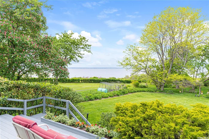 Cozy waterfront and beachfront cottage on 2 lots with .92 acres of beautifully landscaped property Must Be Seen To Appreciate. Master Bdrm First Floor. There Are No Words To Explain. Beach Front 3 1/2 Baths. Finished Basement. Open Floor Plan.