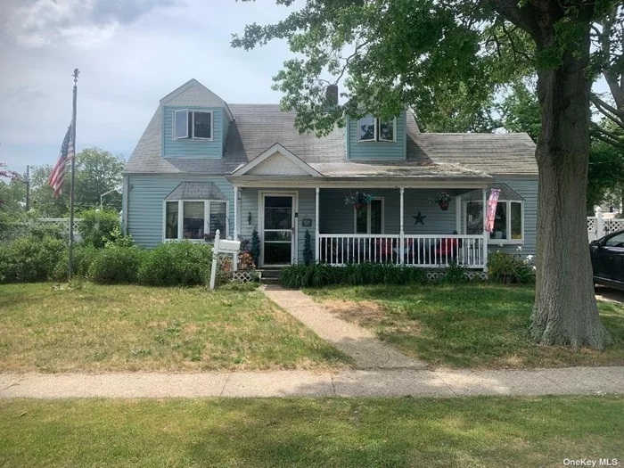 Dormered & Extended Charmer with Front Porch, Rear Covered Patio..  8 Rooms, 4 Bedrooms, 2 Fbths with Jetted Tubs. Large kitchen, dining room family room. 3 car Driveway.