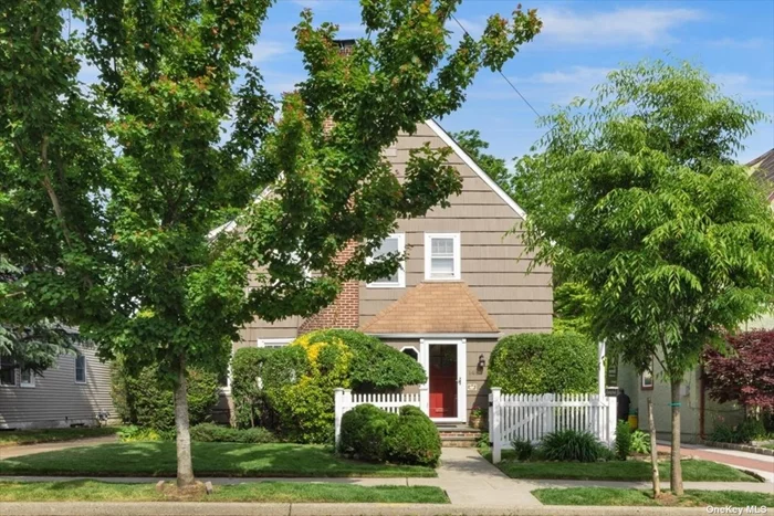 Welcome home to sought after Hewlett! This lovely 3 bedroom, 3 bath home greets you with beautiful greenery and a white picket fence. As you step inside past the unique entryway you head straight into your massive living room area. Your cozy formal dining area is the perfect place to share a meal with those who matter most. A sun filled den with built-ins bookshelves lead to a vast deck in your backyard. And just wait until you see your oversized kitchen with high end stainless steel appliances and lots of storage. Upstairs are your bedrooms, each of which is a generous size.The Master Suite offers a tall ceiling that soars above you, three mirrored closets, and a lovely bath with soaking tub. On top of all this, you&rsquo;ll be close to Hewlett station for quick access to the City. Schedule your private tour today!