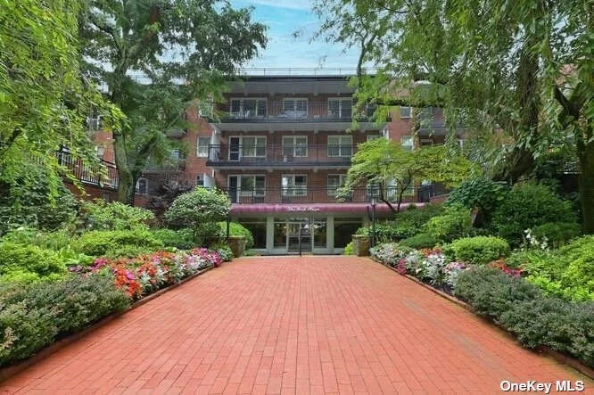 The Park Stoner Cooperative Class A Building offering concierge services located in the most desirable area - The Village Great Neck Plaza. This apartment is in close proximity to the LIRR, n20, n21 Bus to Flushing, Grace Ave. Park & is designated for renowned Baker Hill Elementary School & GN South Middle & HS, Steppingstone Park & Parkwood Pool. This deluxe 2 bedroom 2 bathroom apartment has a formal traditional layout with a large foyer, dining area, galley kitchen, wooden floors, & beautiful terrace facing front with unobstructed scenic views of Kensington Village. This building has newly renovated lobby & hallways, Indoor garage parking, wait list for storage closet. There is a resident managing super,  porter, video surveillance, circular driveway, all on one of the most beautiful, private desirable streets. This bright apartment features large rooms, abundant usable interior space, ample closets, and lovely surrounding buildings w/ low maintenance, and 2 exposures.