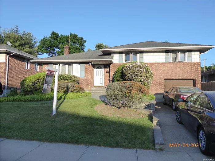 Solid Brick Split Level in award winning Jericho Schools. Anderson windows, fully fenced yard, 4 car driveway, 2 zone alarm system, enunciator on front door, whole house attic fan, roof under 10 years old, Oil heat and hot water but house has natural gas for the stove, easy conversion to gas possible. Great home waiting for a new owner!