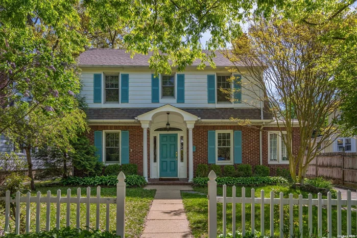 Classic Center Hall Colonial Built In 1928 Located In The Heart Of Oyster Bay. Updated Gourmet Kitchen With Stainless Steel Appliances, Formal Living Room W/ Wood Burning Fireplace, Cozy Sunroom/Office, First Floor Laundry Room, Updated Full Baths, & Hardwood Floors Throughout. Full Basement & Walk Up Attic Are Both Perfect For Tons Of Storage. Gas Heat & Sewer Plus A Detached Two Car Garage! Move In & Start Enjoying All Oyster Bay Has To Offer!