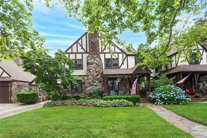 Super Over-sized Tudor in the Heart of Williston Park Village. Mid-Block Location, All Rooms are Oversized, Hot Tub under Covered Patio, Eat-in Kitchen, Living Room with Fireplace, Dining Room, Master Bedroom Suite with Bathroom, 2 Car Garage, Full Finished Basement & Attic, Solar Panels (Average Electric Bill $25) Move Right In, if you Love Tudors, this is your next home!