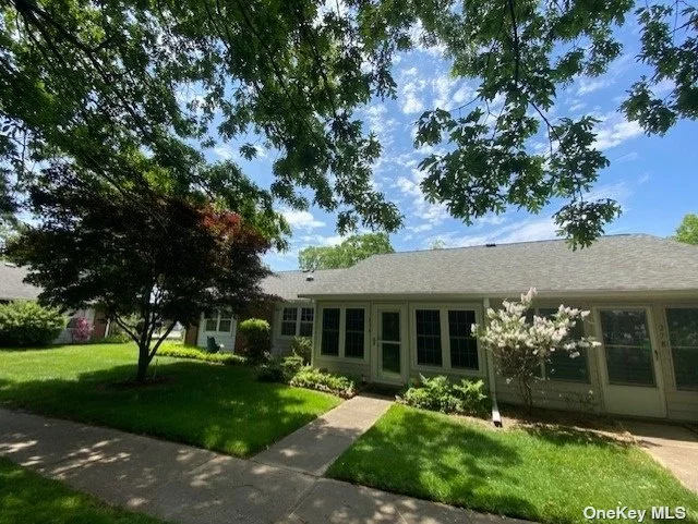 Corner Baronet model, walking distance to club house! Updated windows, a/c compressor, wooden doors, kitchen appliances, hot water heater, bathroom with walk-in shower, solar tubes, porch converted with new windows, sheet rock and extra insulation with added storage closet, granite countertops and Pergo flooring in kitchen, with new appliances!!