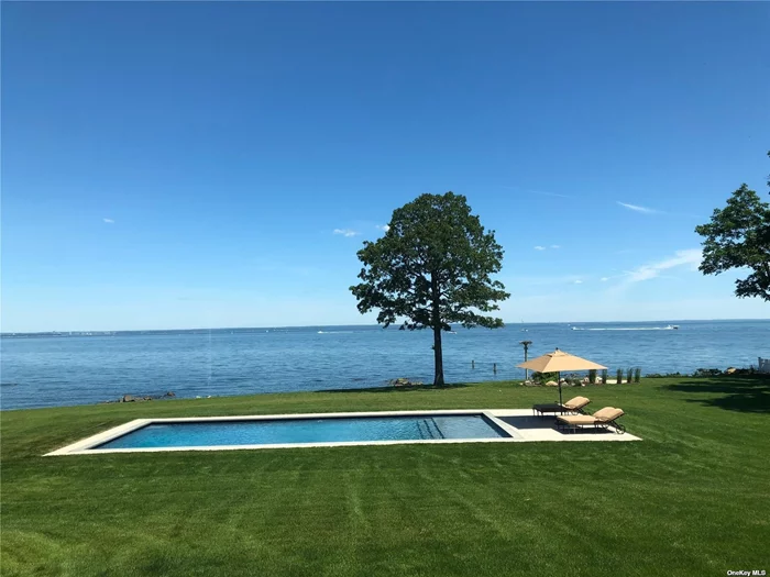 Welcome To This Stunning TRUE Waterfront Estate On LI&rsquo;s Gold Coast With Panoramic Unobstructed Waterviews. And A Private Deepwater DOCK And Boat RAMP (Permitted) On The Property. It Also Has The Unique Advantage Of A Sandy Beach & A Second Harborside Dock With Mooring Rights (Assocn). This Hamptons Style Shingle Home Was Fully Finished in 2019 W/No Expense Spared, & Gleaming Wood Floors and Exquisite Millwork Throughout. The Elegant 2-Story Foyer Boasts A Bridal Staircase And Breathtaking Water Views And Flows To A Family Room With A Gorgeous Fireplace And Stunning Kitchen With Walls Of Glass To Enjoy The Views Year Round. The Master Bdrm Has A Home Office And A Gorgeous Marble Bathroom W/Wall-to-Wall Waterviews. The Home Features 1st Fl. Guestroom & Separate 2nd Fl. Movie Theater. Outside A Sparkling Blue Infinity Pool Is Flanked By A Kitchen & Paver Patio And A Waterfront Fire Pit With Addn&rsquo;l Entertaining Space. 5 min to Caumsett, 15 min to Huntington.
