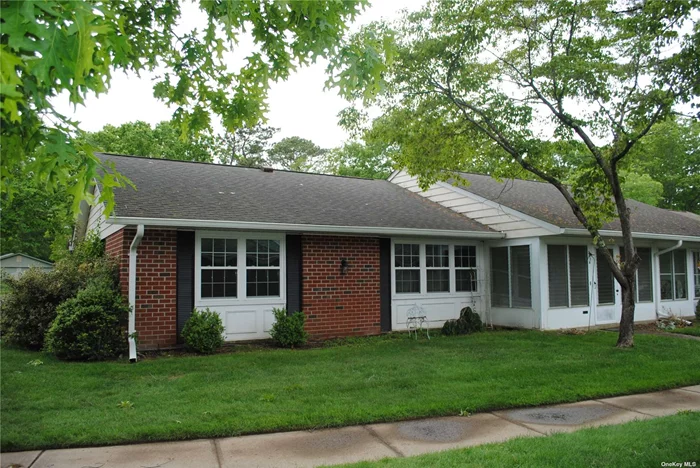 Corner Baronet with updated windows thermostats, and a/c. Laminate floors. Newer appliances.