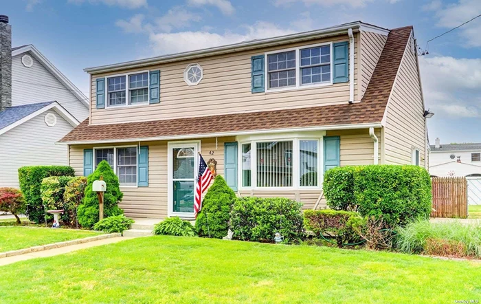 Welcome to this updated 4 bedroom 2 bath Colonial style home in the prestigious Massapequa Shores. This lovely home features an updated eat in kitchen with ceramic tile floor, granite countertops and gas cooking. Open living room with hardwood floors throughout. Large master bedroom on main level with double closets. Another room off the kitchen for utilities,  washer/ dryer and pantry. The second floor has 3 large bedrooms, and a full bath with skylight. This home also features 2 sheds, 4 year-old roof and 2 zone heat. Close to shopping, houses of worship and TOB Philip Healy Beach at Florence Avenue. This home will not last.