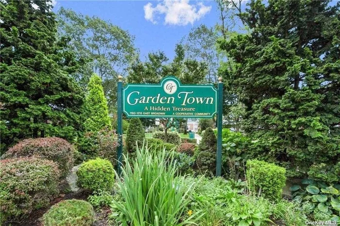 This garden town 1st floor unit boasts 2 bedrooms and 2 full baths, with hardwood floors throughout and a private washer/dryer. Enjoy the serene view of the beautifully landscaped courtyard from the large terrace. Indoor parking is available, as well as nearby municipal parking. The location is conveniently close to the LIRR, shops, and restaurants, making it a perfect choice for comfortable living