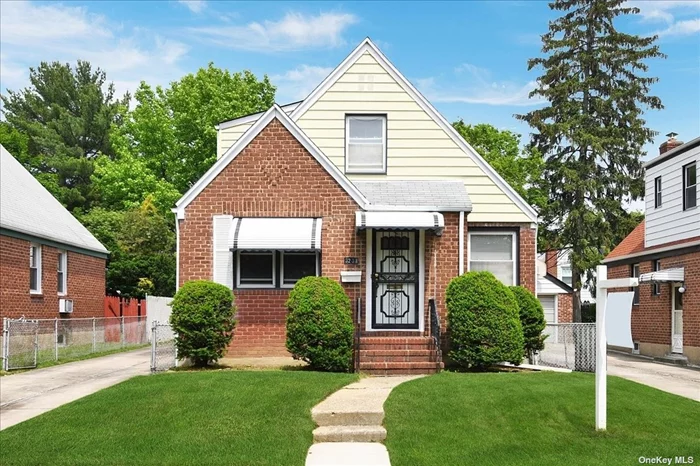 Charming and Bright Brick Cape in Bayside! Freshly Painted Throughout with Beautiful Hardwood Floors. Located in Top School District 26! This Clean, Well Maintained Home features Main Level-Living and Dining Room, Kitchen, 2 Bedrooms, 1 Full Bath. Second Level has 2 Bedrooms and 1 Full Bath. The Large Finished Basement with Wall Unit can be used as Family/Play Room. Long Driveway for extra parking with 1 Car Garage. Very Convenient Location to Transportation and Shopping!