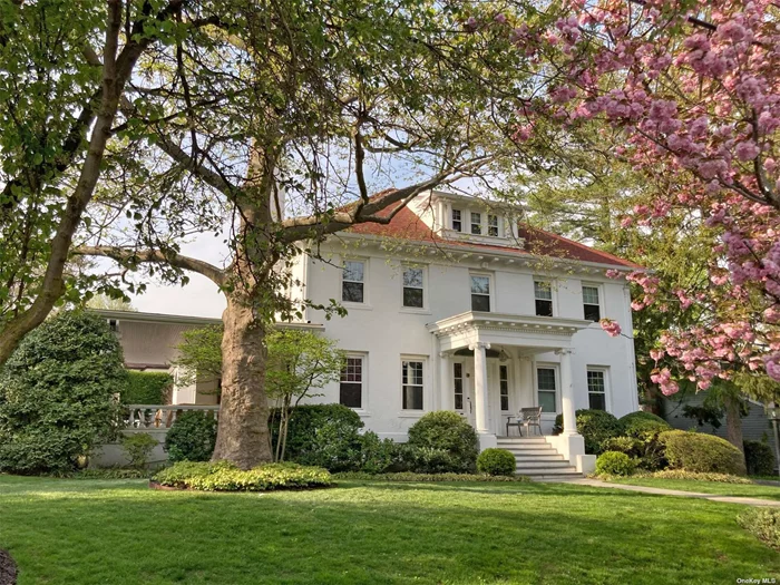 Gracious Living combines with modern lifestyle in the heart of Port Washington. The Grand Foyer, Living Room and Dining Room capture the elegance of times past with 10 ft ceilings, French doors, and fireplace. The Main Level private office plus a later addition with open Great Room/Kitchen and mudroom/butlers pantry make this a once-in-a-lifetime residence. Full walk up attic with finished storage rooms and more, plus full basement with spacious rec room and more. 2 zone CAC, whole house generator. Magnificent Mediterranean Covered Terrace offers exceptional outdoor living - overlooking luscious private, landscaped grounds with charming waterfall garden feature. Galloway beach rights with available membership.