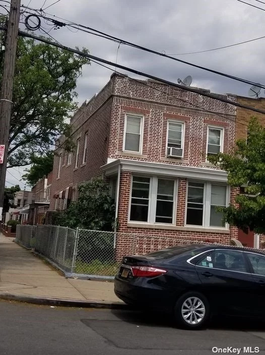 Two Family house in Ridgewood with two car garage, all brick!