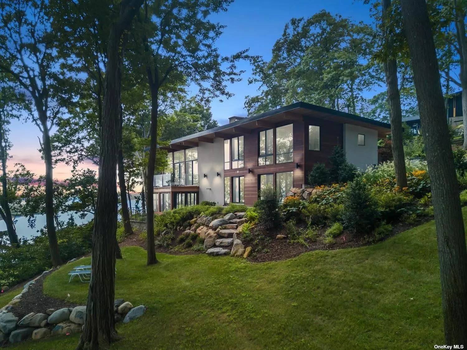 This irreplaceable waterfront home is perched on a gentle bluff with sweeping vistas. A 1955 True Mid-Century Classic Designed by Architect Keith I. Hibner & completely renovated to perfection with all the original elements left in place by the current owners.The sleek design is a hallmark of Mid-Century aesthetic.The dramatic entry takes one to the unparalleled, panoramic views from every vantage point in the home. This once in a lifetime living experience offers a stunning sunken living room with white oak flooring & a floor to ceiling wood burning fireplace with original stone facade & mantel. Access the outdoor deck and sitting area, where one can relax & unwind only steps away from 500&rsquo; of your own private waterfront with beautiful sandy beach & mooring. Entertain with ease in this state-of-the art Henrybuilt kitchen with sliders to the Ipe decking, fire pit, barbecue & unobstructed western views that allow an indoor/outdoor living, dining experience all year round. CSH SD#2