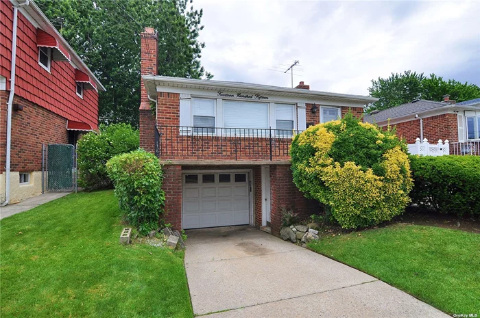 Spacious Raised Ranch Brick House Located in a Highly Desirable Neighborhood R3-2 Zoned with Building Size 26x48, Lot Size 42.42X100. Sturdy Hardwood Floors,  Total of 3 Bedrooms with Full Basement. Plus One Car Attached Garage, Extra Storage. Near Fort Totten Park, Schools, Shops, Bay Terrace Shopping Center, Clearview Golf and Public Transportations, Q31/Q28. Easy Access to Major Highways. Sold As Is. 360D Virtual Tour Available,