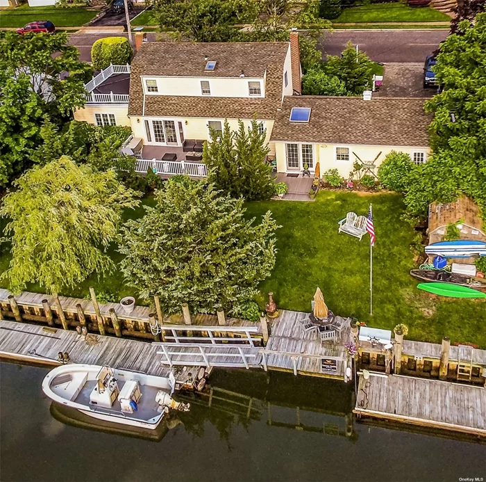 Ahoy Captains and Mermaids! A Boater and Fisherman&rsquo;s Paradise! Updated, Sunny and Spacious Dutch Colonial on a Wide Canal with 100 Ft of Deep Dockage only Moments to the Bay. Multi Level Decks and Outdoor Space are Perfect for Family, Friends, and Entertaining, Plenty of Room for an IGP,  2 Car Pavered Driveway and Paver Walkways, Foyer, 1st Floor Study/Office or Possible 4th Bedroom, Spacious Family Room with F/P, Spacious Den with Vaulted Ceiling and Skylight, 2 Sided Custom Stone Fireplace, Central AC,  Mahogany Flooring, Elevation Certificate, Flood Ins. Only $801, Taxes are Being Grieved. Less then 1 Hr to NYC, Close to Bay Beach and Park. Pics Coming Soon!