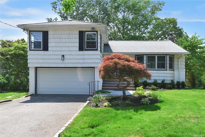 Spacious and sunlit Renovated 3 bedroom 2 Full bath split level located in the heart of Salem.  Hardwood floors throughout Den with fireplace w/radiant tile floors with sliding glass doors to beautiful deck . Extremely private and secluded backyard recently redone with expansive foliage views from the yard and deck.