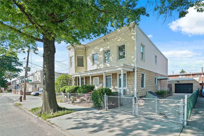 Location, Location! This corner property located on 69th St. near Eliot Ave. features3 bedrooms over 3, full basement, private driveway for 3 cars & 1 car detached garage