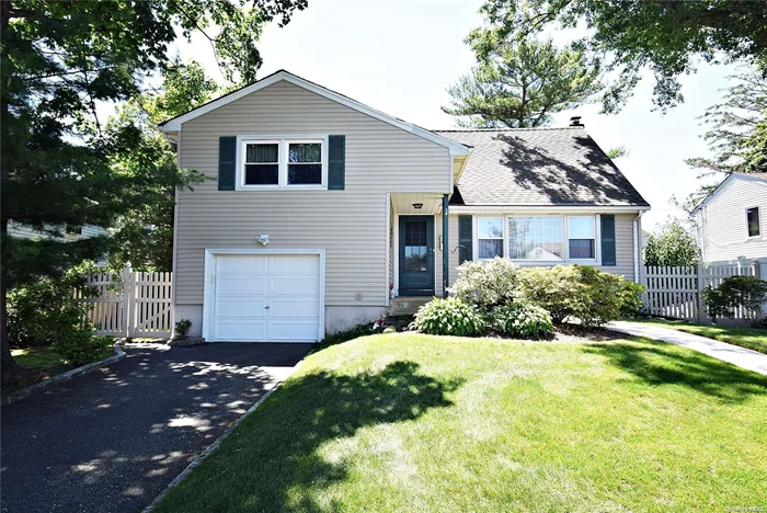 Splanch Home features Hardwood floors, spacious living inside with a lot of windows and storage .Full Basement, attached Garage leading into Foyer with sitting room to do some work or enjoy knowing that you could be outside in a min to enjoy the grounds.