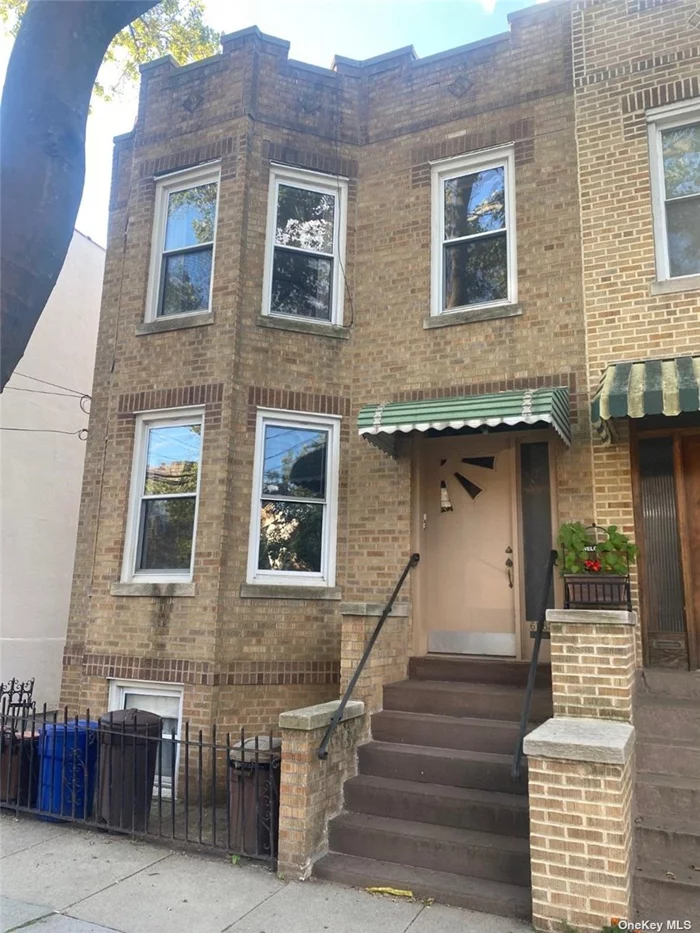 2 FAMILY BRICK SEMI-DETATCHED HOME THAT ASLO HAS A LARGE DETATCHED 2 CAR GARAGE WITH HIGH CEILINGS, NEAR SHOPPING , TRANSPORTATION AND CLOSE TO M TRAIN TO MANHATTAN, HOME NEEDS TLC BUT LOCATION IS TERRIFIC