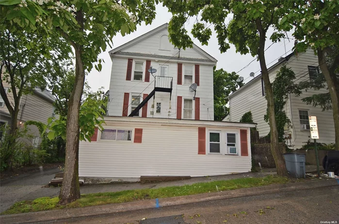 Legal 4 family home being sold in As Is condition. Two 1 bedroom, 1 bath apartments. Two 2 Bedroom, 1 bath apartments.Coin operated laundry for entire building. $4900 monthly rent roll. All tenants currenly on month-to-month leases. Tenants pay their electric and gas for cooking.