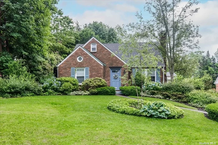 Quintessential Expanded Brick Cape In The Beacon Hill Section of Port Washington for $1, 100, 000. Sitting High On A Grand Front Lawn, This Beautifully Maintained 3 Bedroom 2 Full Bath Home Boasts Hardwood Floors And An Oversized Kitchen Built For A Chef. Beautiful Doors Lead Out To A Large Deck & Serene & Private Plush Backyard Space. The Sun Drenched Den Extension Makes For A Great Entertaining Space and Includes A Wood Burning Stove Perfect For Cold Winter Evenings. The Traditional Feeling Of The Home Is Continued In The Dining Room & Living Room W/ Wood Burning Fireplace. Upstairs Includes Two Oversized Bedrooms, Full Bathroom, And An Additional Tandem Room That Would Be Perfect For A Bedroom, Closet, or Home Office Space. The Full Basement Includes A Separate Room Perfect For Guests Or A Home Office Space. Additional Features Include Gas Heat/Cooking, And A Spacious Driveway. Convenient Mid-Block Location, Close To Town, Train, Beach & The Middle School & High School.