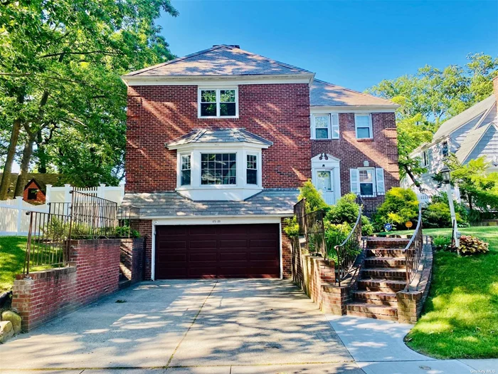 Spacious 5 Bedrooms 4.5 Baths Brick Colonial House For Rent In Jamaica Estates. Homes Features Circular Stairs, Formal Living / Dining Room, Eat In Kitchen, Fireplace. First Floor Master Bedroom With Full Bath. Second Floor Boosts 2 Master Bedrooms & 2 Additional Bedrooms. Located Close To Transportation , Shopping , House Of Worships.