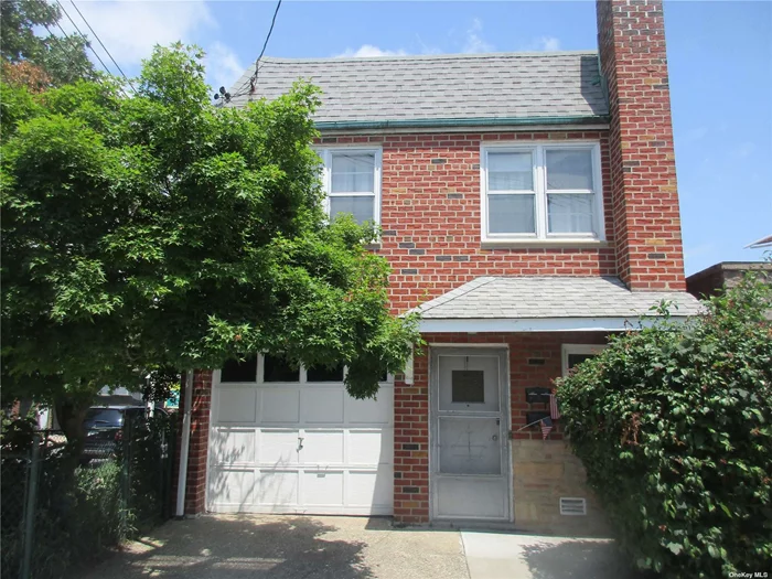 Legal 2 family brick detached with private driveway and attached garage. 5 large rooms over 3 large rooms. Corner property. Walk to M train and bus and ALL shopping.