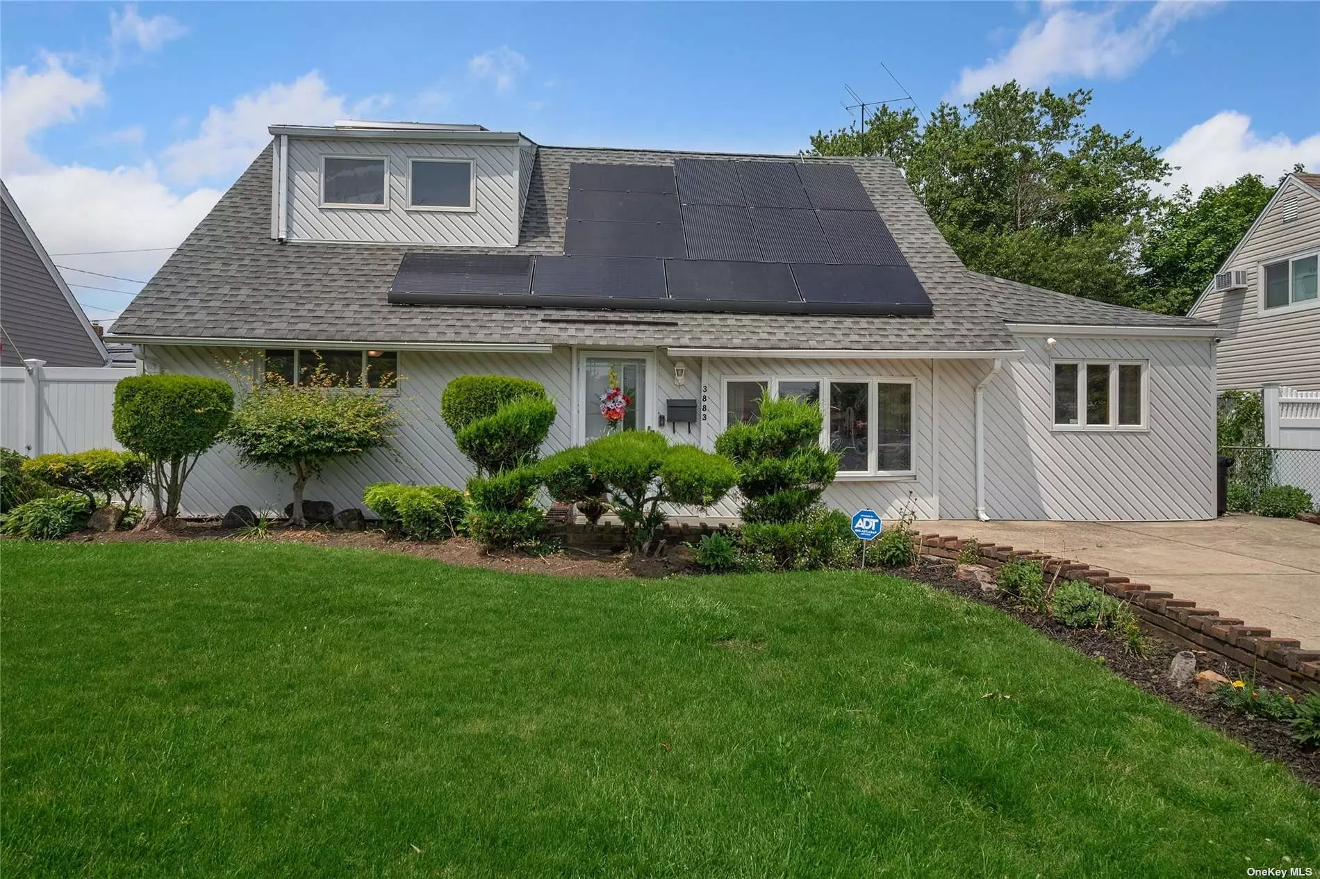 Welcome Home To This Nicely Updated Expanded Cape! This Home Boasts Formal Dining Room, Formal Living Room, Updated Kitchen w/ Granite Countertops, Stainless Steel Appliances And Pantry. Oversized Den With Skylights And Sliders To Deck That Spans The Length Of The Home Makes Entertaining Indoors And Outdoors A Breeze. Main Floor Storage Room And Laundry. Updated Main Bath, 200 Amp Electric, Smart Sprinkler System, Solar Panels, Built In Alexa, Smart Nest, Fresh Paint And New Carpet. This Fully Fenced Property In The Bethpage School District Will Not Last!