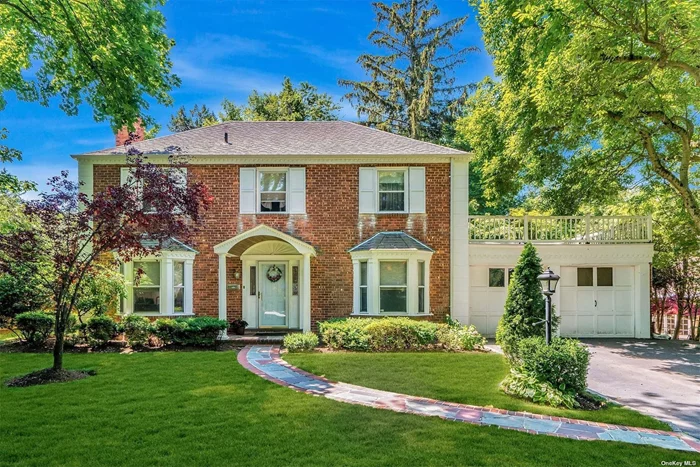 South Strathmore Traditional brick Center Hall Colonial sits proudly on a large flat property. The entry is an elegant foyer with a curved staircase leading to the second level. The first floor has a generous size formal living room with a wood burning fireplace and French doors, powder room and formal dining room with Bay window that leads into the large kitchen with separate eating area with sliding glass doors that leads to the back garden.The second floor features a large primary bedroom with walk in closet and en-suite bathroom, two additional bedrooms and full bath. New Central Air Conditioning. Close to schools, public transportation, Americana shopping center and major highways. Home is being sold As Is