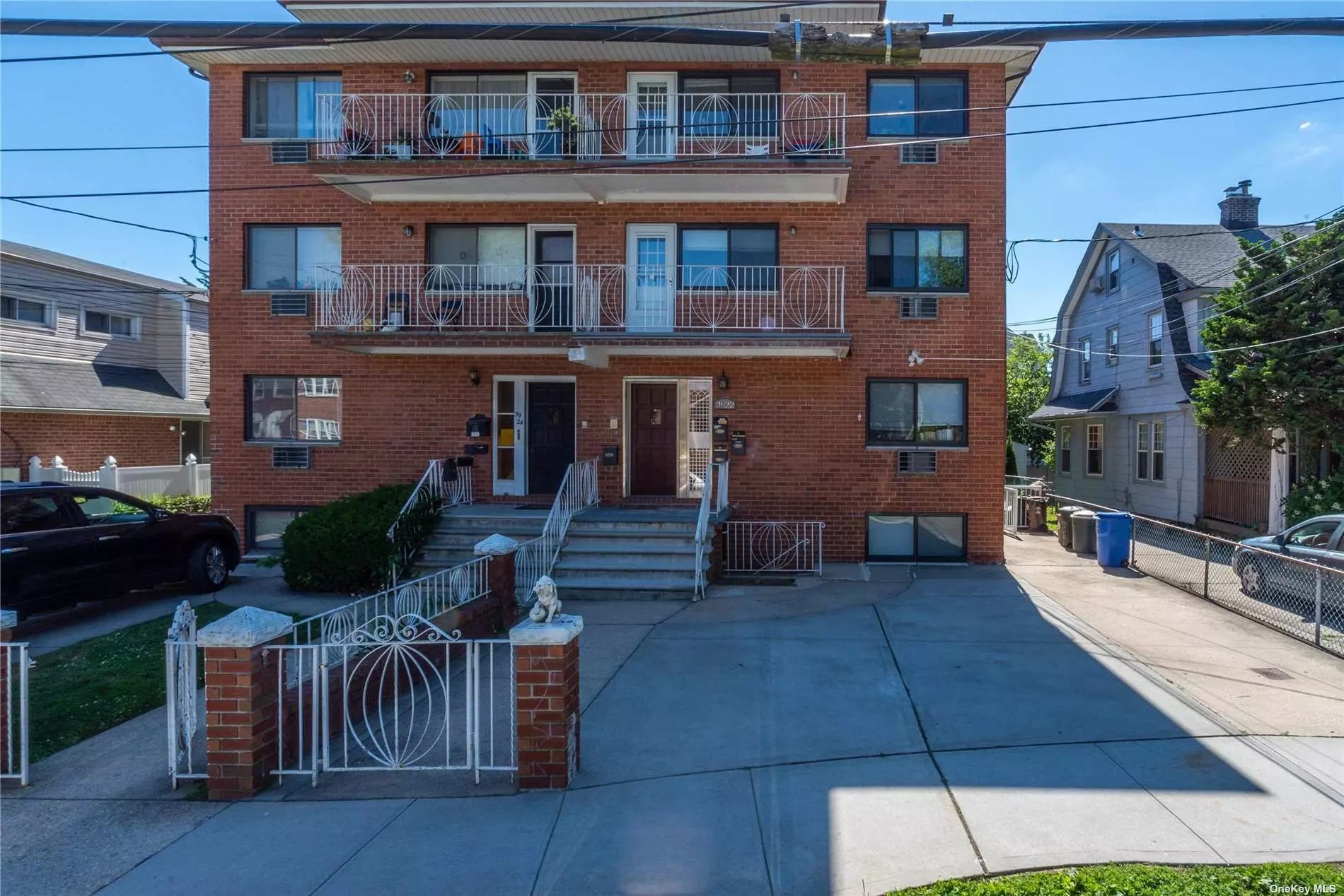 This meticulous and completely updated large 3 family building is a great investment opportunity. Conveniently located just a block away from the LIRR and just two blocks from bell blvd. where all the shops and restaurants are located. Each apartment hosts 3 bedrooms, 2 full bathrooms, an updated eat in kitchen, living room, dining room, refinished hard wood floors, and updated crystal windows. This building also offers 2 parking spaces in front. The full basement is a walkout with high ceilings. It also hosts a common coin operated laundry room equipped with a folding station.