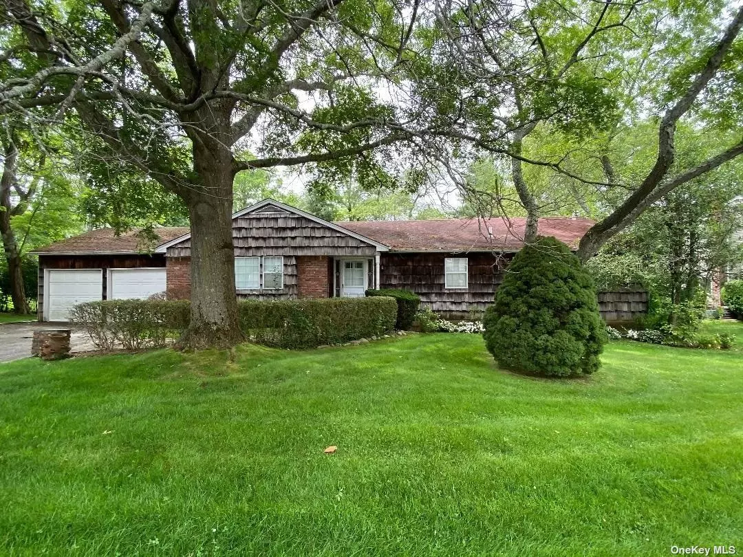 North Syosset!! Ranch with 3 bedrooms, 2 full baths and full finished basement with 11 ft ceilings. 2 Car Attached Garage on an Oversized Lot! Village Elementary, Southwoods MS and Syosset High School. Room For a Pool ! A Must See! Will Not Last!