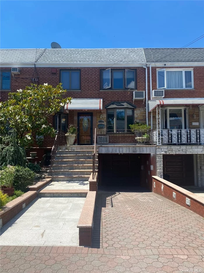 beautiful 2 family , 2 bedrooms over 2 bedrooms , full finished basement with beautiful hardwood floors, private driveway, garage and private yard, near express buss to Manhattan , 1st floor and basement are vacant , 2 nd floor has tenant with no lease and will be delivered with building .