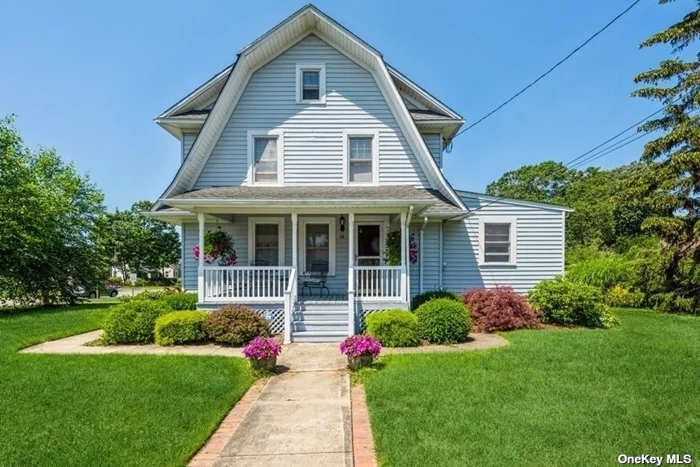 Charming 3 bedroom, 2 full bath Colonial with a rocking chair porch on a beautiful large corner lot. Bright & breezy, freshly painted, well loved and maintained home in Islip school district. Expanded kitchen dining area and den, Living room, home office, first floor bath with shower and laundry, hardwood floors, three 2nd level bedrooms, spacious full bath and a bonus spacious walk up attic just calling for some one to finish this space! Detached 1.5 car garage. This is a wonderful home that will not last! First showing at open house on Saturday.