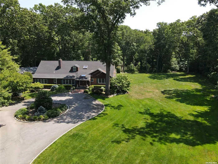 Privacy Abounds In This Spacious 4 Bedroom 5.5 Bathroom Farm Ranch Located At The End Of A Cul-De-Sac On 2 Flat Muttontown Acres. Entertain With Ease As The Layout Flows Effortlessly From The Large Living Room With Wood Burning Fireplace To The Den With Soaring Ceilings And Loft Above. The Dining Room Can Accommodate Large Parties And The Oversized Eat In Kitchen With Views Of The Yard Will Make You Want To Learn To Cook; But The Real Party Begins In The Basement With Full Bar, Room For All Your Gaming Tables, And Generous Sitting Area. In Addition There Is An Outdoor Entrance That Leads You To The Expansive Yard And Pool. Back On The First Floor You Will Find The Master Bedroom With Separate Sitting Area And Renovated Bath. On The Second Floor Are Two Bathrooms And Three Bedrooms One Of Which Is En-Suite. Detached 3 Car Garage, Decking, And Must See Yard With Pool Round Out This Listing. Truly A Must See To Appreciate The Size And Versatility Of This Property. Jericho Schools