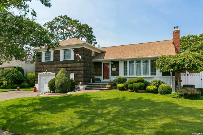 Welcome to this beautiful Spacious Split located mid block in Unqua gardens featuring ceramic tile entryway leading to living room with wood burning fireplace on full brick wall . Spacious kitchen and oversized dining room. 3 Bedrooms, master bath plus full bath, family room with sliders to a beautiful backyard and in ground pool. CAC, full finished bsmt, 1 car garage.