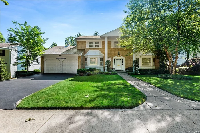 MOVE-IN READY! Welcome to this beautifully maintained Center Hall colonial home situated on a tranquil cul-de-sac in the heart of prestigious University Gardens. The Main Floor Layout Reflects a formal style of Living with large entertaining rooms and plenty of natural sunlight throughout every room. The eat-in kitchen opens to a large new deck perfect for those summer barbecues. A winding stairway leads to the second floor offering a primary suite with walk-in closets and an en-suite bathroom, in addition to 3 large bedrooms and a full bath. The full-size lower level has an additional bedroom and bathroom with sliding glass doors leading to a private backyard. Neighborhood amenities include a private pool, tennis courts, and a playground area. Low Low Taxes! Must see! Won&rsquo;t last!