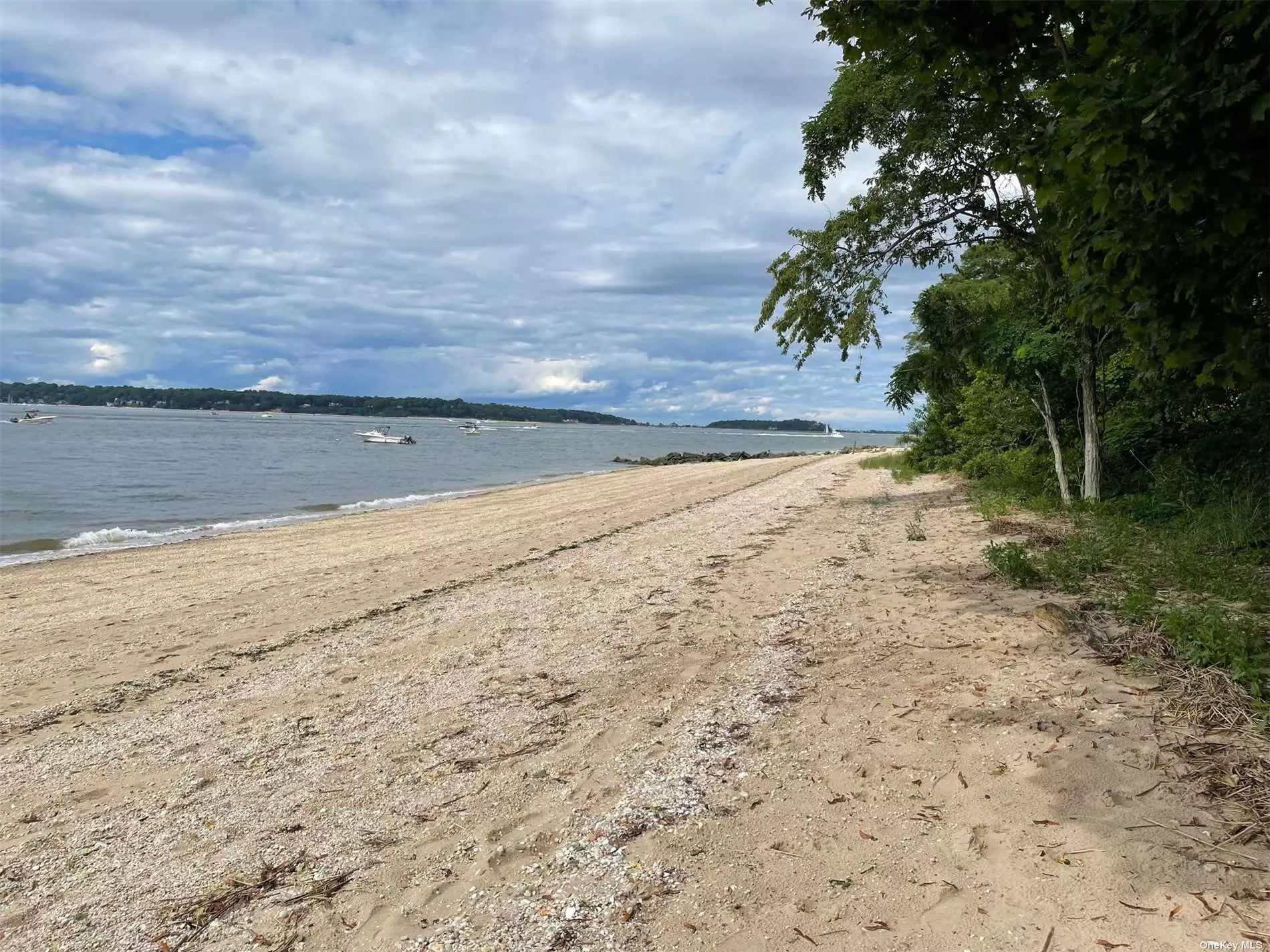 Simply beautiful, 160&rsquo; of direct waterfront property on Huntington Bay. The property is naturally terraced and is elevated up from the Bay with views to the Northwest of Lloyd Neck and Eatons Neck. Simply fabulous.