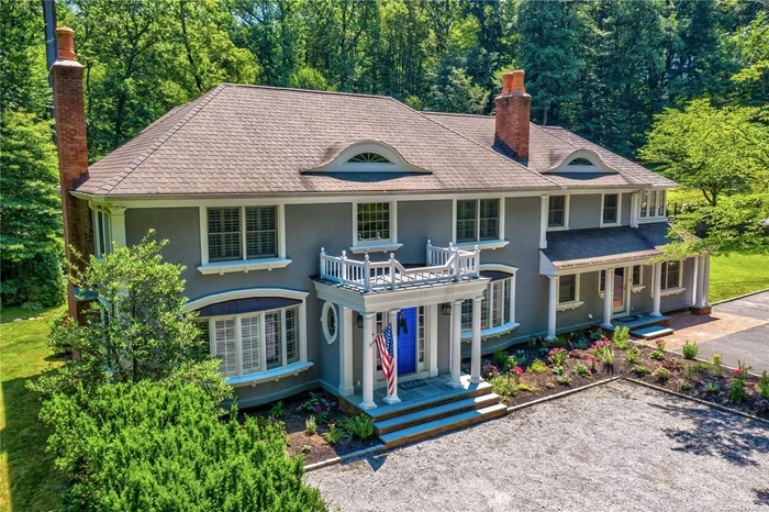 A gated entry greets you at this special 4 bedroom Revival style colonial. This residence has been custom renovated with quality and style. A cooks kitchen with lots of counter space including center island. Induction cooktop, Steam Oven, 2 dishwashers and farm sink are some of the unique features of this stunning space. The Den w/fireplace and built-in shelving is a comfortable space for gathering. The luxurious Master Bedroom suite with fireplace and sitting room overlooking the heated pool and pool house. 3 car detached garage.