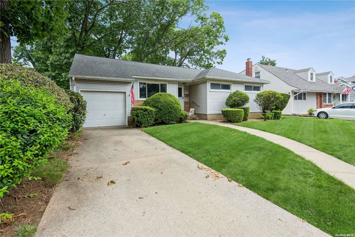 Enjoy a cozy covered backyard patio area, attached garage, hardwood floors throughout and an open concept layout. Full basement with room for entertaining and separated room for laundry and utilites.