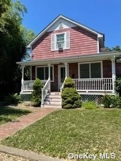 Colonial style home with old world charm in a great location. Gently worn, in need of some TLC. Upper level bathroom recently updated. Fenced in backyard. Access to the Great South Bay just moments down the street and near historic Bellport Village. Property has a workshop and rentable cottage. Low taxes.