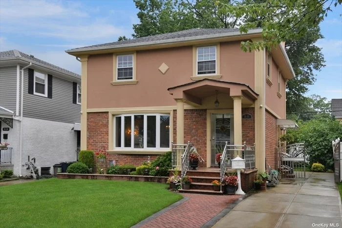 Lovely Detached Brick/Stucco Colonial on A Great Block in Fresh Meadows! Sparkling Clean and Well Kept Home. Main Level presents LR, FDR, EIK, 1/2 Bath. 2nd Floor present 3 Bdrms, 1 Full Bath. Finished Bsmt w/ Family Room. Private Yard & Long Driveway for Multiple Cars. Beautiful Curb Appeal w/Brick Pointing, New Pavers and Concrete. Great Mid Block Location, Quiet Tree Lined Street. Top School District 26. Very Convenient to Transportation and Shopping!