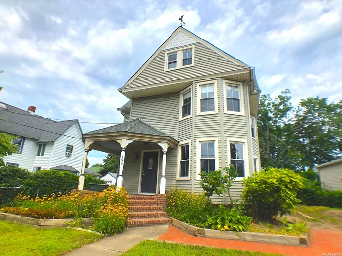 Amazing opportunity to transform this magnificent circa 1908 gem into the home of your dreams. Features include; High Ceiling, Original moldings, Tin Ceilings, Hardwood Floors, Glass Pocket and Solid Wood Doors with original hardware along with a massive great room with wood burning stove and spectacular Walk-Up Granny Attic. This diamond in the rough has newer siding, roof and windows and all the charm you can only find in older homes. Property sold as is with tons of potential and endless possibilities. Best Value South of Main !