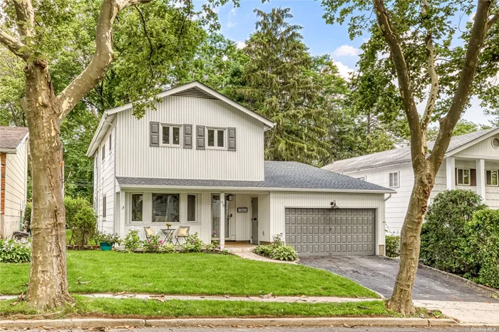 Backyard dreaming- Totally updated 4 Bedroom 2.5 Bath home offering a ton of space to enjoy indoor/outdoor living filled with light. Two decks provide outdoor access to a backyard that is truly a private oasis. So many updates, including: new central-air, new windows, new roof, new hardwood floors.