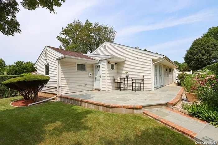 Immaculate, remodeled (2013), 4 bedroom, 2 f/bath RANCH, 2 car updated garage detached with extra storage space on a 5980 sq ft lot. A large deck at the entrance overlooks manicured landscaping and trimmed green hedges that fence the property. Open floor plan boasts a huge kitchen with oversized cabinets, quartz countertops, stainless refrigerator, gas range, dishwasher, tiled flooring leading into the Dining area which is separated by slider doors to the washer/dryer section w/storage cabinets. Large family room gets abundant daylight through double French doors opening out into a flower garden. A beautifully renovated F/bathroom with tile flooring and granite vanity leads you to 3 spacious bedrooms with great closet space and Pergo floors. Back features a PRIVATE master suite with full bath, tile flooring, granite vanity and linen closet. Master suite leads out into a fenced patio and the garage. Updates include new roof, vinyl siding & Sprinkler System. Ceiling fans in every room..