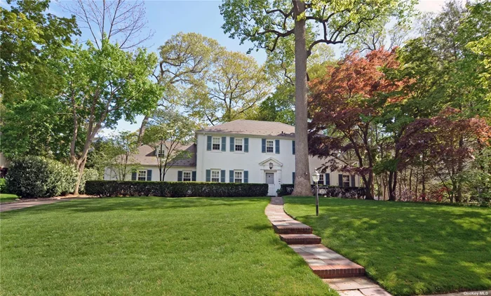 Magnificent Center Hall Colonial set in the center of one of PW Estates most beautiful blocks. Newly refinished hardwood floors through most of 1st and 2nd floor. Fabulous EIK with breakfast room and butlers pantry. Gracious LR w/fp, Formal DR, Den/office, Family rm w/vaulted ceiling & loft, and Sunroom. Wonderful MBR suite w/bath & large wi closet. Walk up 3rd floor w/bonus space. Full Basement w/2 bonus rooms w/new carpeting. CAC through most of home except Fam Rm, 4th Bdrm, 3rd flr, and bsmt. Wall AC units in Fam rm. Beach and mooring right at PW Estates Beach w/paid membership. Private fenced in yard w/deck IG sprinklers in front yard.