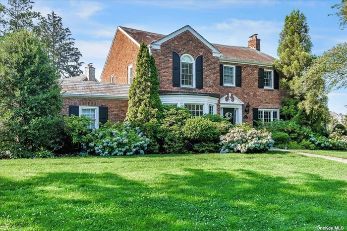 Magnificent Strathmore Vanderbilt Center Hall Colonial Located On an Oversized Manicured Property Featuring a Huge Formal Living Room w/ Fireplace & Custom Built Cabinets w/ Wet Bar & Wine Fridge, A Banquet Formal Dining Room,  Eat In Kitchen w/ Granite Counter Top w/ Stainless Steel Appliances & Separate Breakfast Nook Area, Den/ 4th Bedroom, Master Bedroom Suite w/ Separate Private Balcony & Spacious Walk In Closets, 2 Large Br&rsquo;s w/ Extra Balcony, 200 Amp Electrical Service, Hardwood Floors Throughout, Whole House Water Filtration, Florida Room, Crown Dental Moldings, Security System, 2 Zone Central Air-Conditioning System, Anderson Windows, 2 Car Garage, Full Finished Basement W/Half Bath & Lots Of Closets. Minutes away from the Americana Shops, Country Clubs and Transportation Including Lirr .Won&rsquo;t Last.