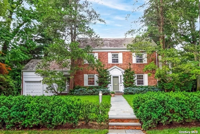 LOCATION, LOCATION, for this pristine classic brick Colonial built in 1938, located mid-block, in a charming neighborhood, overlooking (across the street fm) Allenwood Park and bordering the Village of Kensington! Minutes to LIRR and its nearby shops! The House offers 3379 s.f. of spacious living, 5 generous sized Bedrms, 3.5 updated Bths - Master en-suite w/2 large custom W/I closets w/B/I shelves, a huge sleek Bth w/ Boffi tub, separate shower stall, limestone countertop vanity w/dual sinks, skylite & radiant heated limestone Flrs! Upon entering the house, the Main Floor is completed by a FLR w/Fpl., FDR, an Open EIK w/ streamlined designed cabinetries, complimented by hi-end SS appliances- Wolf oven w/BI exhaust fan, Gaggenau Oven, Bosch D/W, limestone counters w/stools, also w/radiant heated Flrs; a huge Den for entertainment; a private Study w/picture windows overlooking a charming country yard & a Powder Rm. All dbl pane windows & HW oak Flrs thru-out; TRULY a Move-in Ready Home!